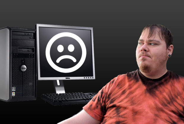 Looking Disappointed at a Dell Desktop